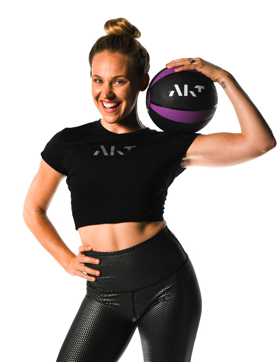 Woman posing with AKT ball